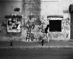 A wall, a child, a window