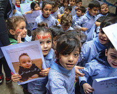 Kids protesting against the violence in Shatila refugee camp, Beirut, Lebanon