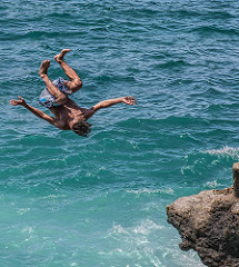 Teens Diving Off Rocks on Beirut's Rocky Shore