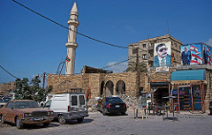 Lebanon, Sidon old city, urban scape with minaret & political banners