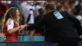 ردة فعل زوجة إريكسن بعد سقوطه مغشيا عليه (صور)