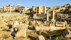 Ruins of the temple of Venus in Baalbek and the city of Baalbek in the background, Lebanon