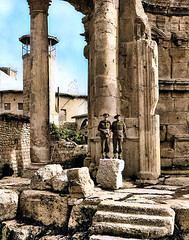 November 1942 - Australian 2/4 Anti Malaria Control Unit troops Len Spencer & Bill Angwin, at the ancient Roman Temple of Bacchus ruins in Baalbek, Syria [now Lebanon] [colourized version]