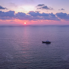 Boat At Sunset